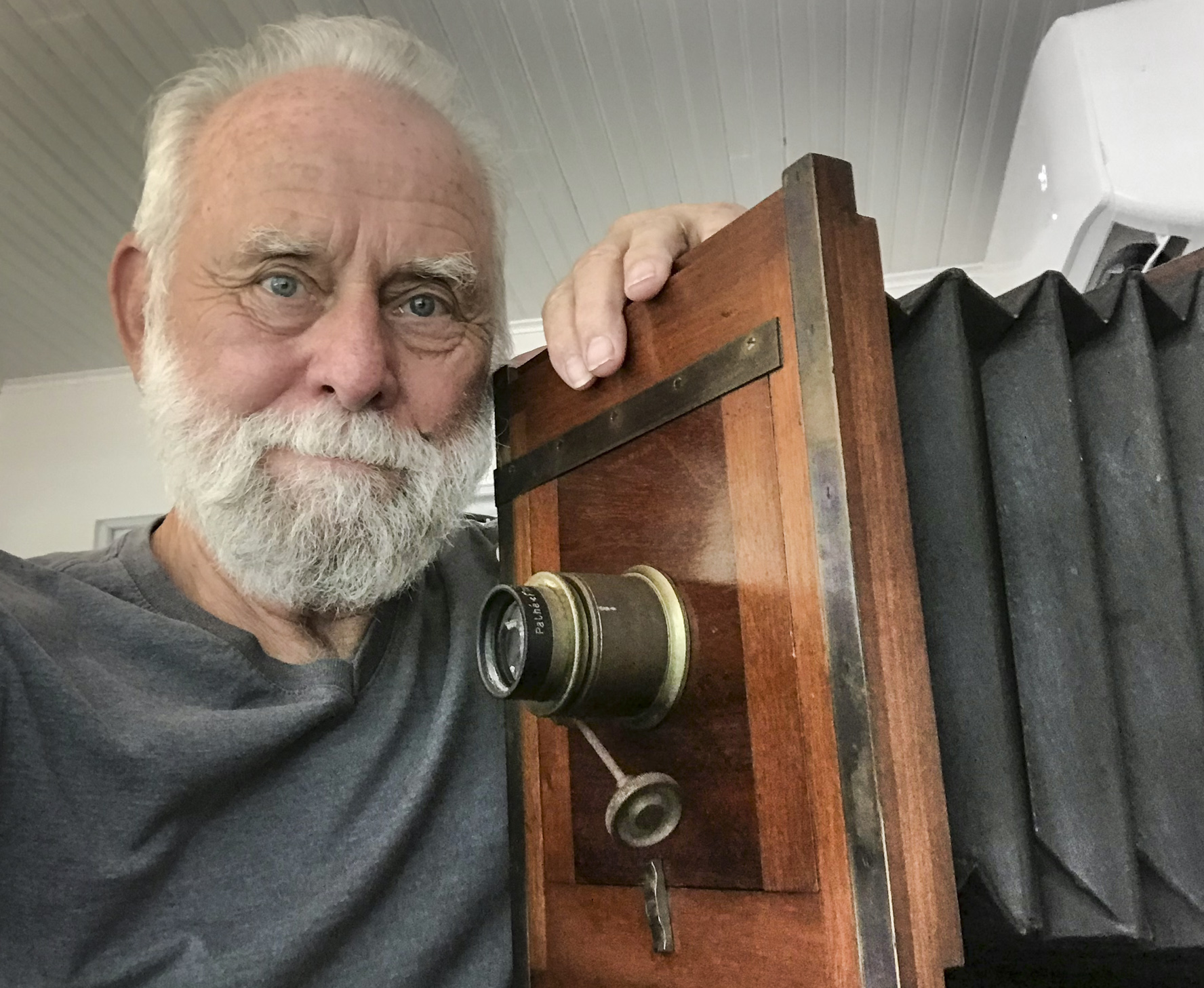 Mr Howse with large old wooden camera